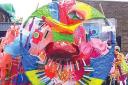 Parade: A colourful dragon's head was one of many recycled creations at the Tooting Trashcatchers’ Carnival