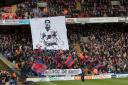 Much loved: The Crystal Palace crowd show their appreciation for Julian Speroni last weekend