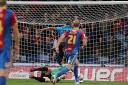Stalemate: Dexter Blackstock scores past Palace keeper Julian Speroni to get the equaliser for Fores