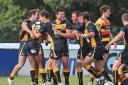 Happy days: Centre Jay Udo-Udoma, left, celebrates the try that gave Esher a 13-7 half time lead in Saturday’s win	  	Deadlinepix SP79128
