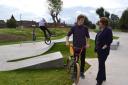 A skateboarder with Councillor Kathy Tracey