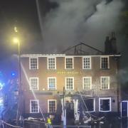 Four men assessed at scene of huge fire at derelict pub in Mitcham