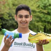 Arminder Singh Dhillon with his invention, the Boot Buddy