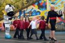 Councillor Maxi Martin, far right, helping children learn about road safety