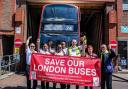 People standing in front of a number 74 bus. (photo: Joanne Harris from Putney Bus Garage)
