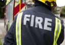 Fire crews tackle fire in a block of flats in Stoughton Close in Roehampton
