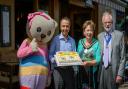 Celebration cake: Alice the Bear, Reza Amini, Councillor Jan Fuller and husband John Fuller