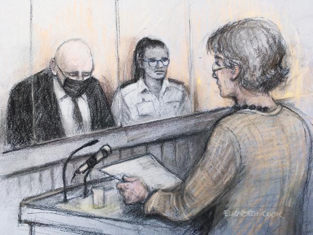 Wandsworth Times: ourt artist sketch by Elizabeth Cook of Susan Everard (right), the mother of Sarah Everard, reading a victim impact statement as former Metropolitan Police officer Wayne Couzens (left), 48, sits in the dock at the Old Bailey in London, on the first day of a two-day sentence hearing after pleading guilty to the kidnap, rape and murder of Sarah Everard.