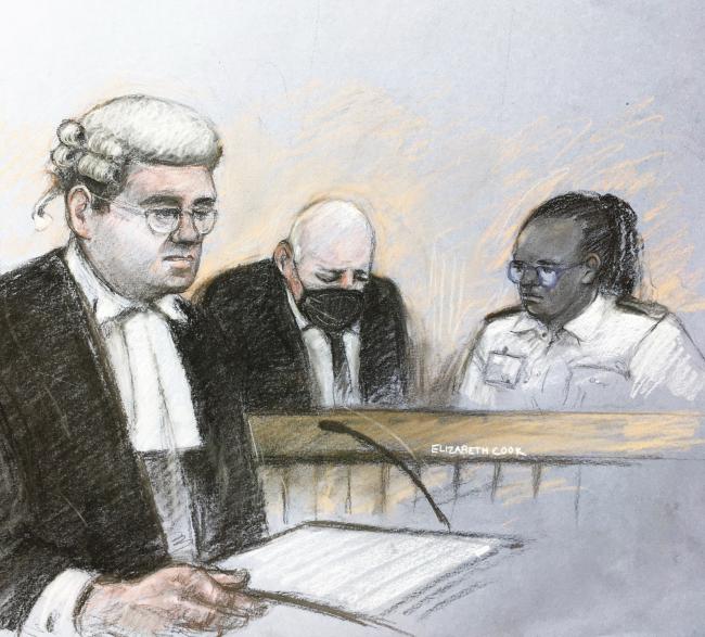 Court artist sketch by Elizabeth Cook as former Metropolitan Police officer Wayne Couzens sits in the dock at the Old Bailey in London, on the first day of a two-day sentence hearing after pleading guilty to the kidnap, rape and murder of Sarah Everard