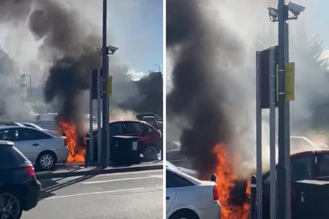 A car on fire in the Sainsbury's car park in Balham (cc Balham Newsie/ Twitter)