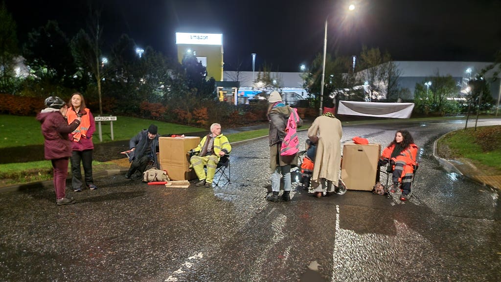 Extinction Rebellion blockades Amazon warehouses on Black Friday morning - Vimarsana News