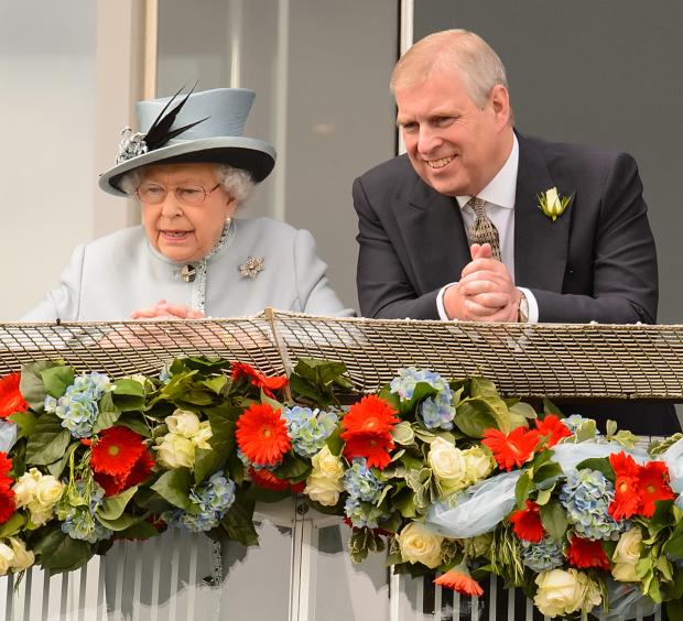 Wandsworth Times: (left to right) Queen Elizabeth II and Prince Andrew. Credit: PA