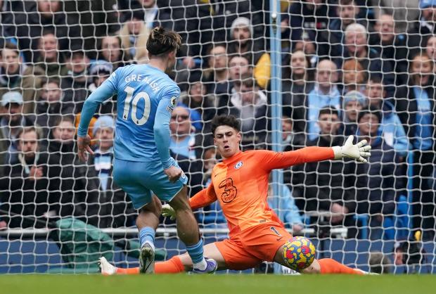Wandsworth Times: Chelsea goalkeeper Kepa Arrizabalaga makes a save from Manchester City's Jack Grealish during the Premier League match at Etihad Stadium, Manchester.