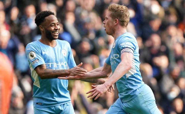 Wandsworth Times: Manchester City's Kevin De Bruyne (right) celebrates with Raheem Sterling after scoring their side's first goal of the game during the Premier League match at Etihad Stadium, Manchester.