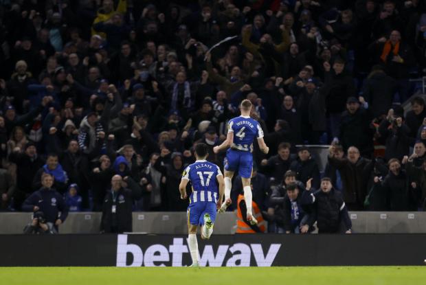 Wandsworth Times: Brighton and Hove Albion's Adam Webster celebrates scoring