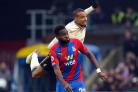 Crystal Palace's Odsonne Edouard (front) and Liverpool's Joel Matip battle for the ball during the Premier League match at Selhurst Park, London.