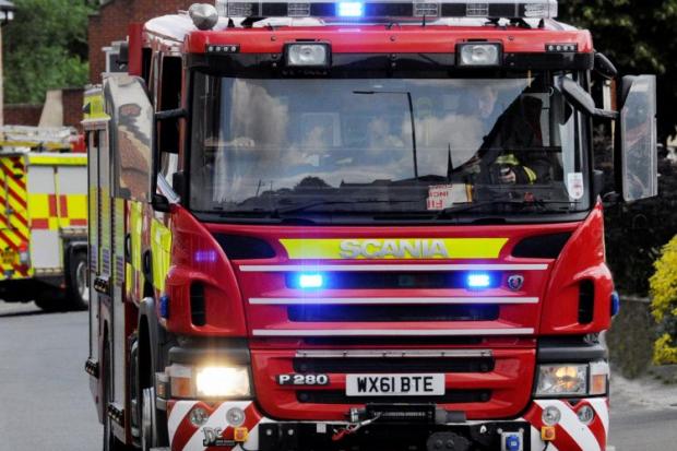 Two men and one woman taken to hospital after maisonettes damaged by fire