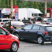 Drivers queue for fuel at an Esso petrol station. Image: Jacob King/PA