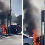 A car on fire in the Sainsbury's car park in Balham (cc Balham Newsie/ Twitter)