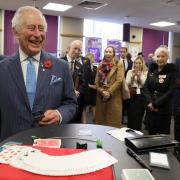 The Prince of Wales (second left) meets magician Chris Wall during a visit to meet Prince's Trust Young Entrepreneurs, supported through the Enterprise programme at NatWest, in London