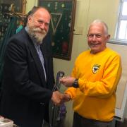 Jon Leech, president of Wimbledon Park Rifle Club (left) presenting a medal to competitor Keith Ealey (right) (photo: Bernie Ealey)
