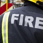 Fire crews tackle fire in a block of flats in Stoughton Close in Roehampton