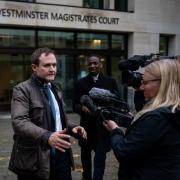 Security Minister Tom Tugendhat leaves Westminster Magistrates' Court in London, where he was banned from driving for six months after being caught driving with his mobile phone in his hand