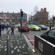 Woman taken to hospital after crash on Streatham High Road
