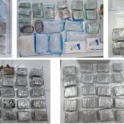 Pictures shared by Wandsworth Police on social media show many wraps and packets of substances seized from the scene