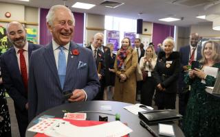 The Prince of Wales (second left) meets magician Chris Wall during a visit to meet Prince's Trust Young Entrepreneurs, supported through the Enterprise programme at NatWest, in London