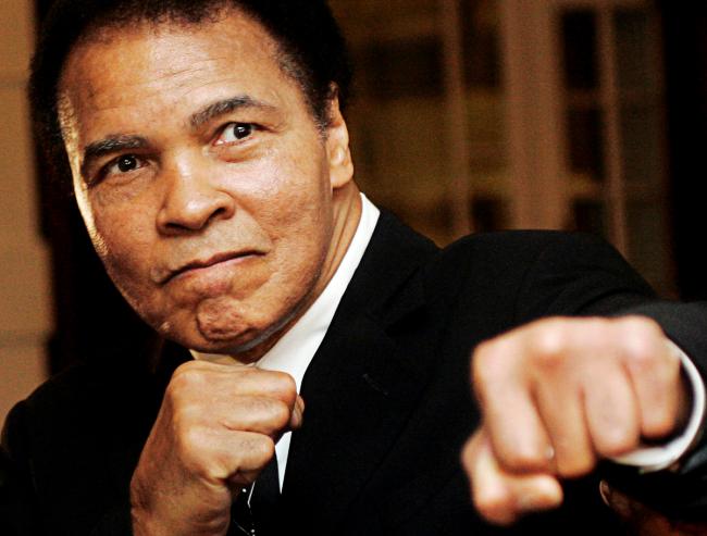 Muhammad Ali poses during the Crystal Award ceremony at the World Economic Forum (WEF) in Davos, Switzerland, on January 28, 2006. Picture: Action Images